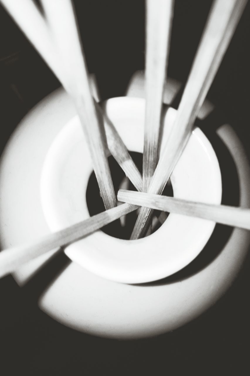 indoors, close-up, white color, white, no people, still life, high angle view, studio shot, spiral, focus on foreground, selective focus, pattern, shape, metal, detail, part of, directly above, design, single object, freshness