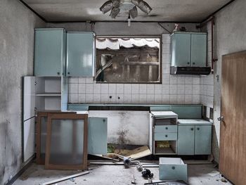 Broken window in abandoned building