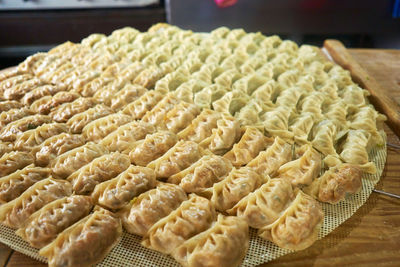 High angle view of dumplings on cooling rack