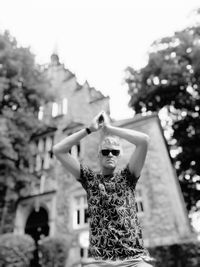 Man standing by building