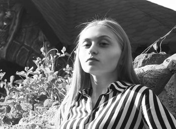 Portrait of young woman looking away