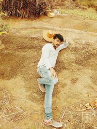 High angle view of woman standing on field