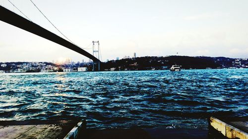 View of bridge over sea against sky