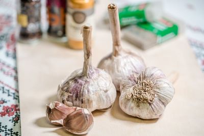 High angle view of garlic on cutting board