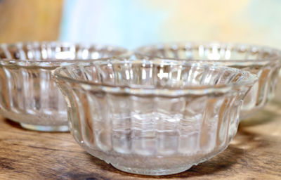 Close-up of glass of glasses on table