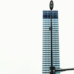 Low angle view of modern building against clear sky