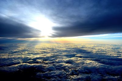 Aerial view of landscape against cloudy sky