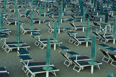 High angle view of empty chairs in row