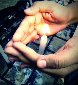 Close-up of baby holding hand