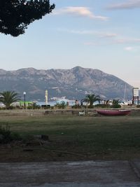 Landscape with mountain range in background