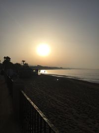 Scenic view of calm sea at sunset
