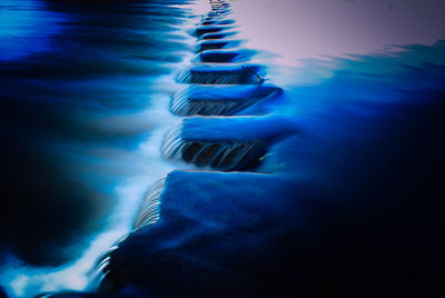 Blurred motion of rocks at sea shore