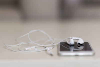 Close-up of electric lamp on table