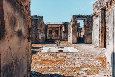 View of old buildings against sky