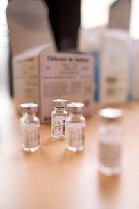 Close-up of medicine bottles on table