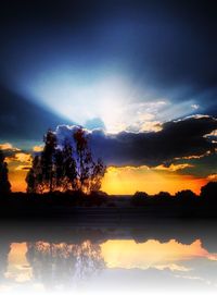 Scenic view of sunset over river