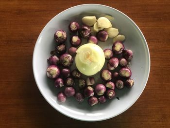 High angle view of fruits in plate on table