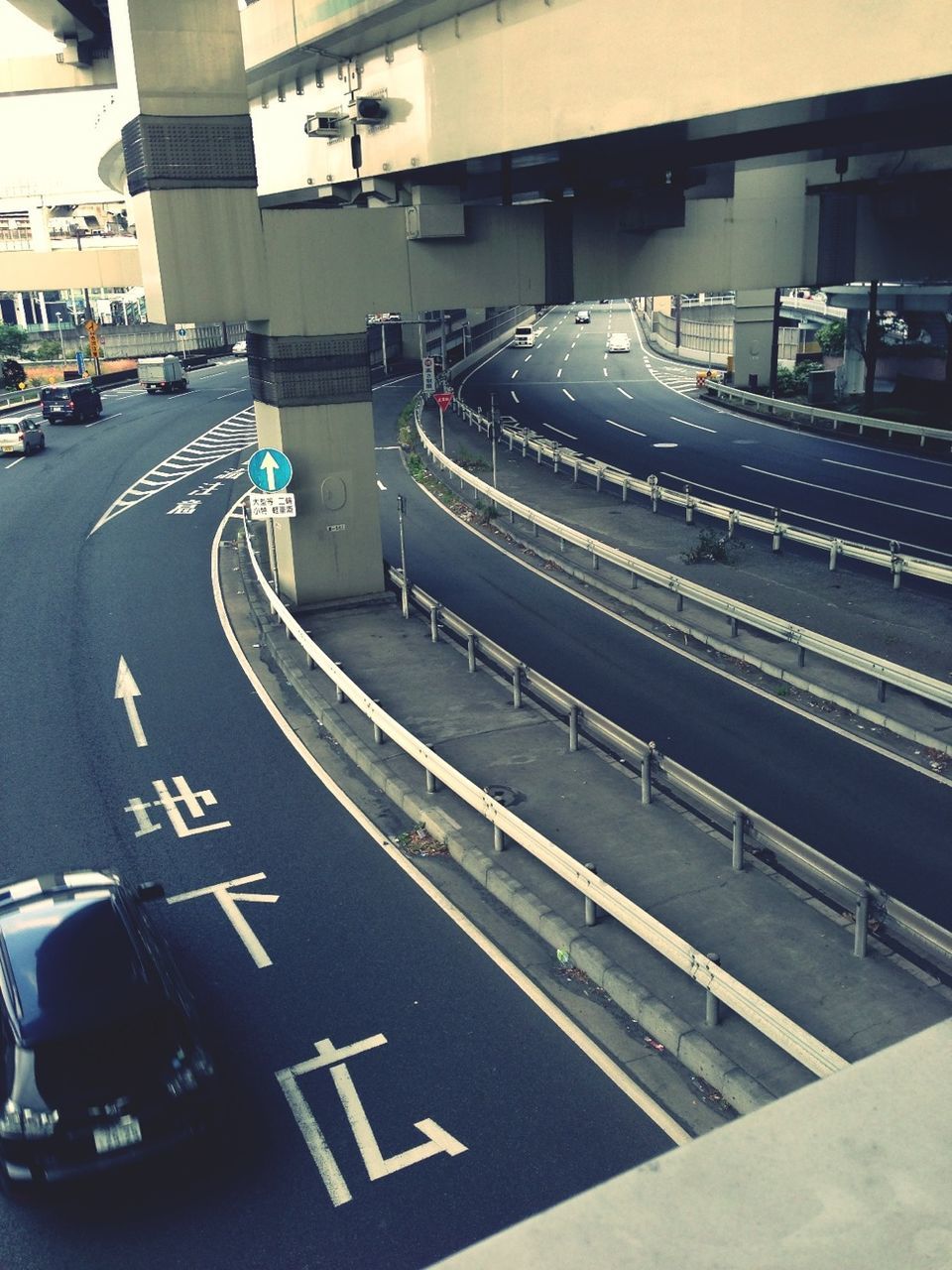 transportation, car, road marking, land vehicle, road, mode of transport, city, street, high angle view, built structure, architecture, traffic, the way forward, city life, travel, highway, city street, building exterior, incidental people, on the move