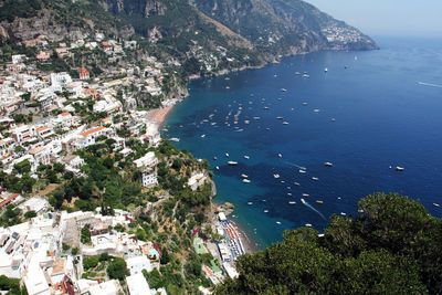 High angle view of town by sea