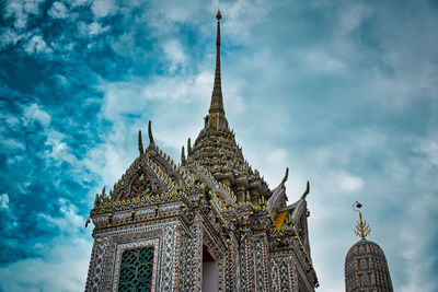 Low angle view of temple against building