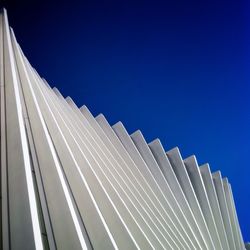Low angle view of built structure against clear blue sky