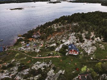 High angle view of trees and buildings against mountain