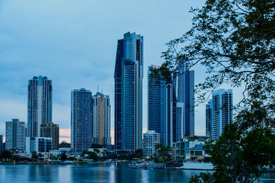 Buildings in city against sky