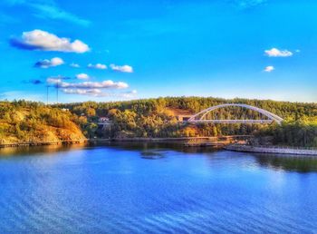 Scenic view of bridge against blue sky