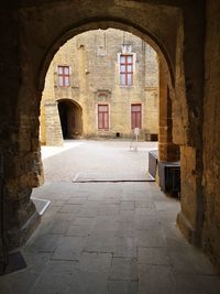 View of empty alley along buildings