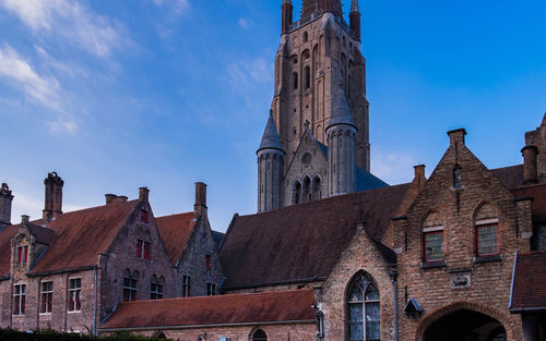 Low angle view of church of our lady against sky