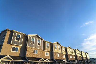 Low angle view of building against blue sky