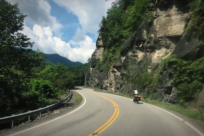 Country road leading towards mountains