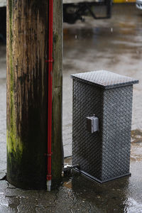 Built structure on wet street in rainy season