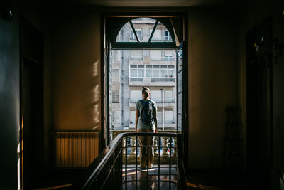 Man standing in front of building