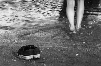 Low section of woman at beach