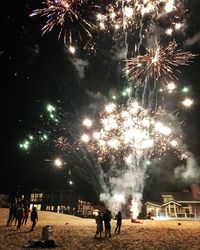 Firework display at night