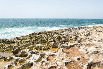 Scenic view of sea against clear sky