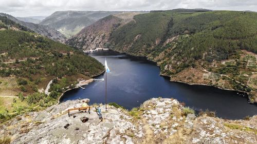 High angle view of river amidst mountains