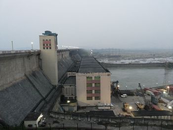 High angle view of dam against clear sky at dusk