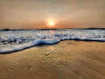 Scenic view of sea against sky during sunset