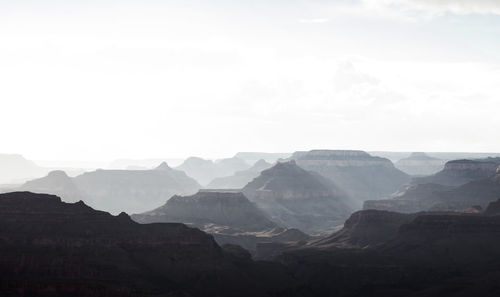 View of mountain range against cloudy sky