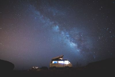 Scenic view of star field against sky at night