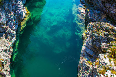 High angle view of rock formation in sea