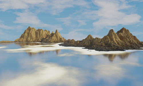 Scenic view of rock formations in sea against sky