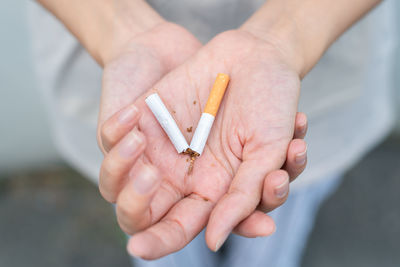 Close-up of person holding hands