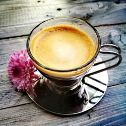 Close-up of coffee cup on table