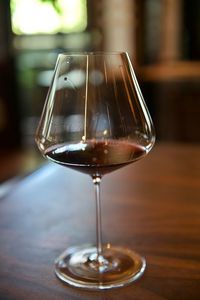 Close-up of wineglass on table