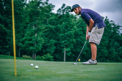 Man standing on golf course