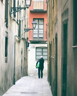 Full length of woman walking in city