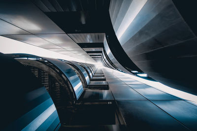 Low angle view of escalator in subway palace